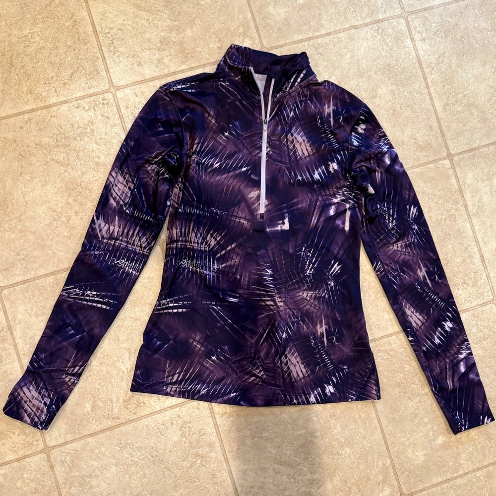 Women’s Purple face line Nike quarter zip.